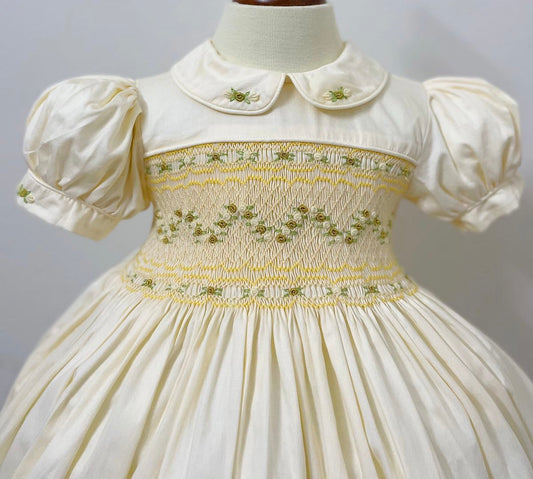 Cream and gold smocked back and front