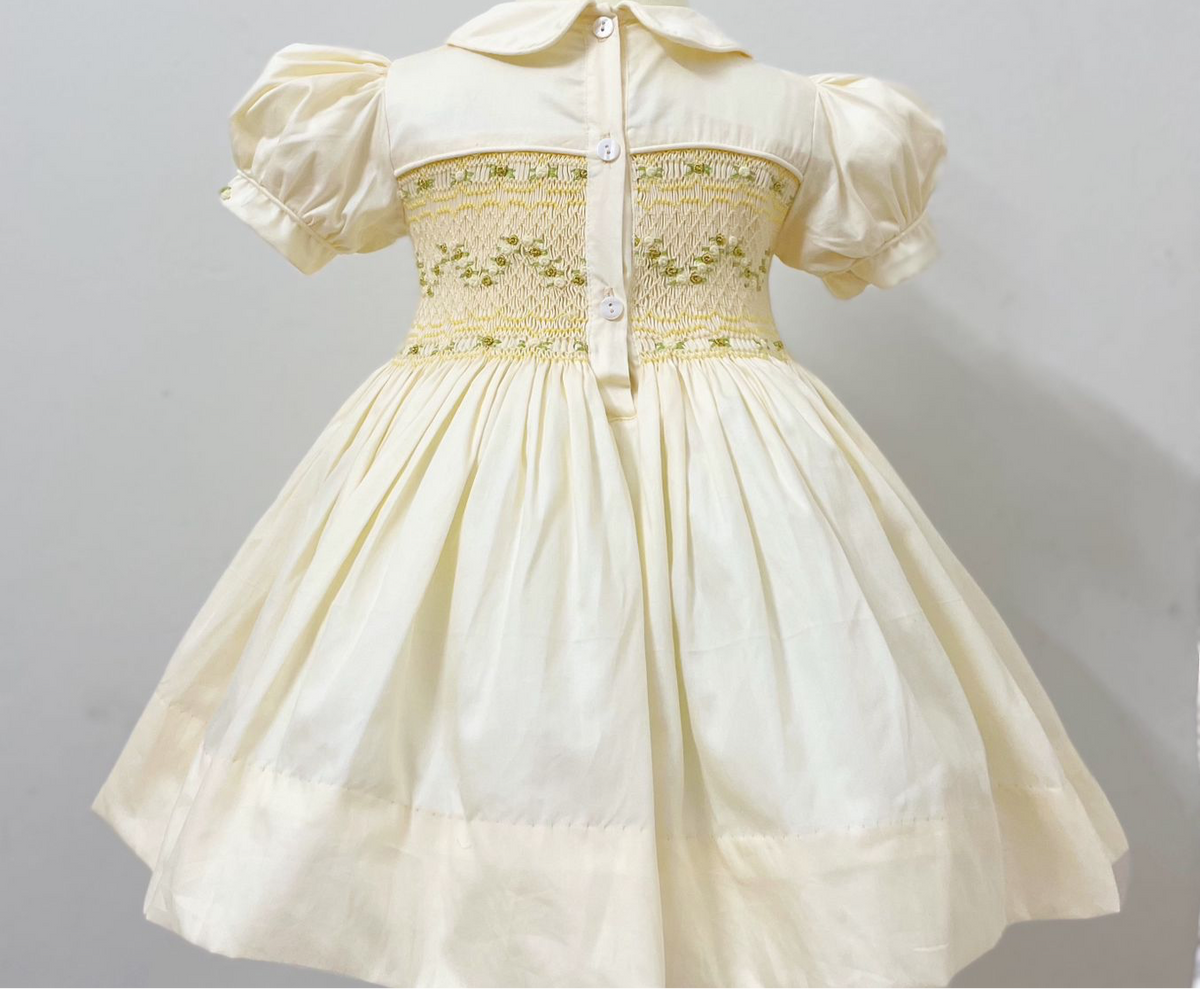 Cream and gold smocked back and front