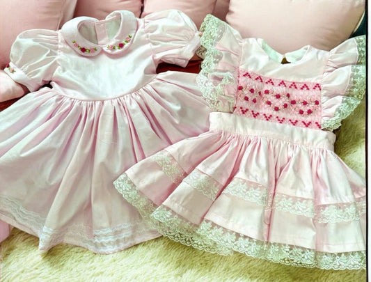 Pink classic dress with smocked pinny