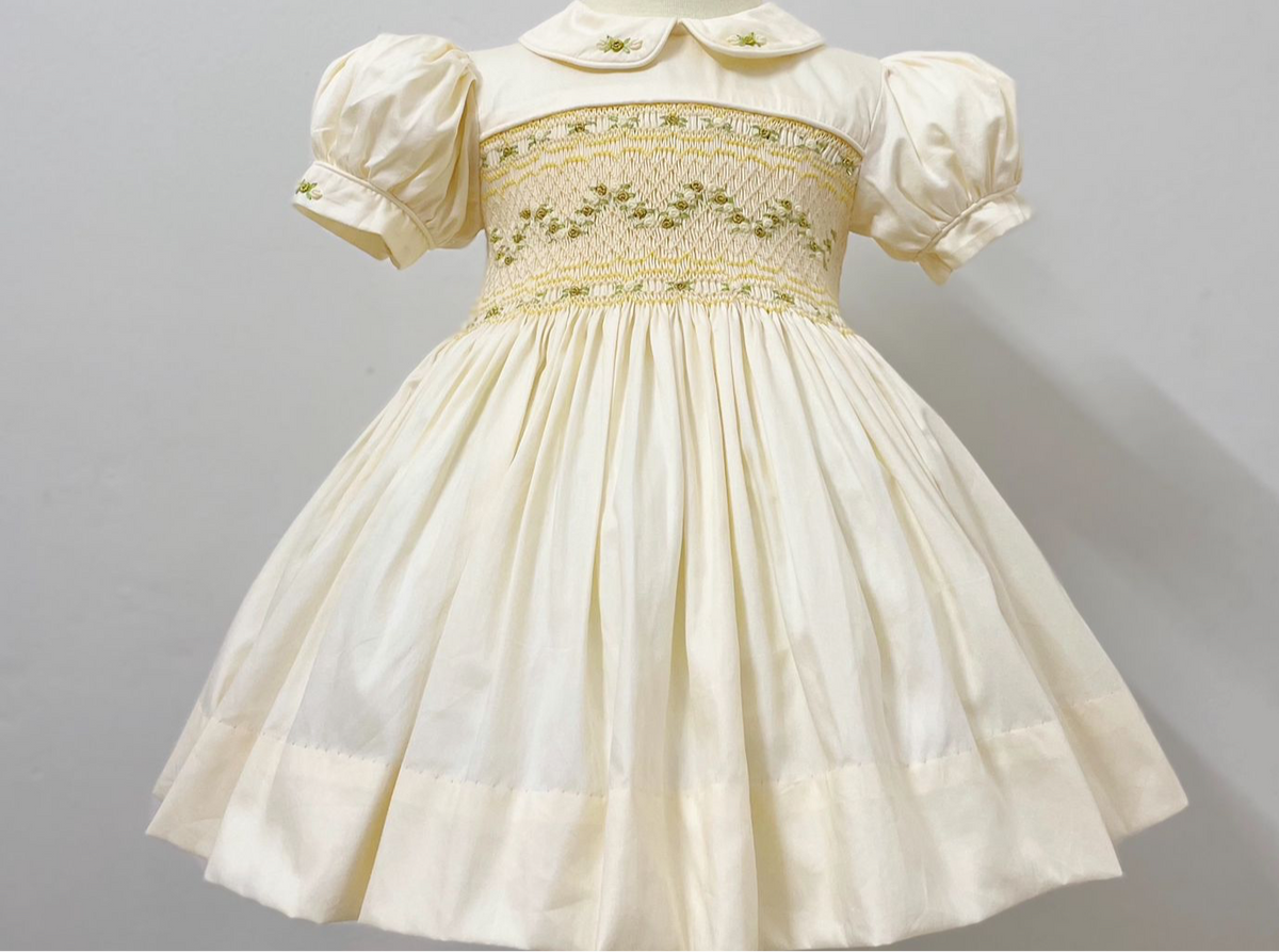 Cream and gold smocked back and front