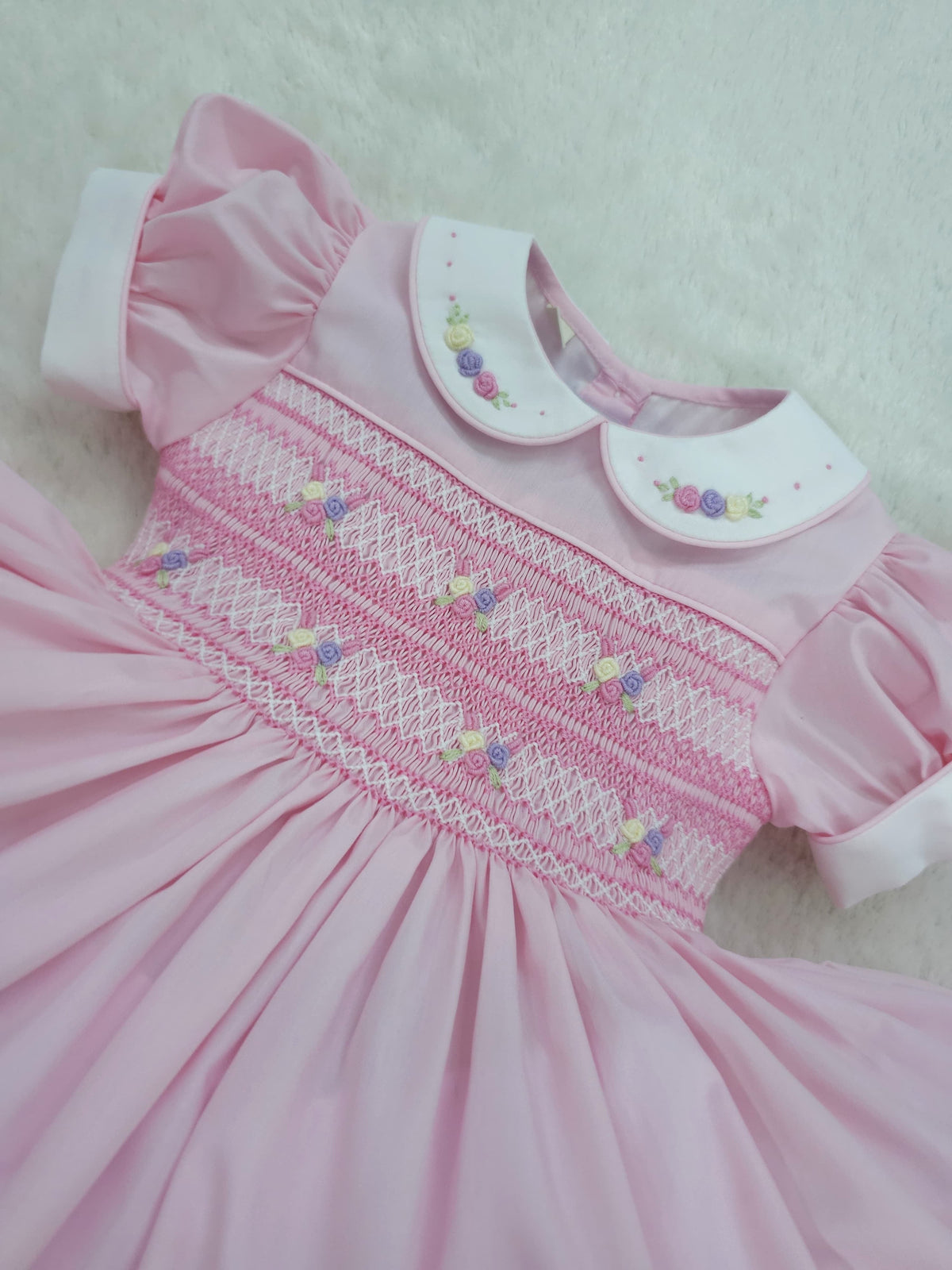 Pink and pastel hand smocked back and front dress