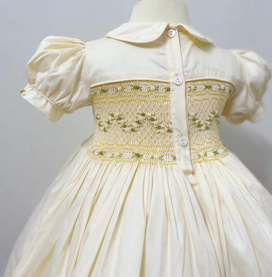 Cream and gold smocked back and front