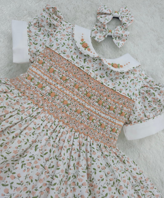 Floral smocked dress with peach embroidered flowers